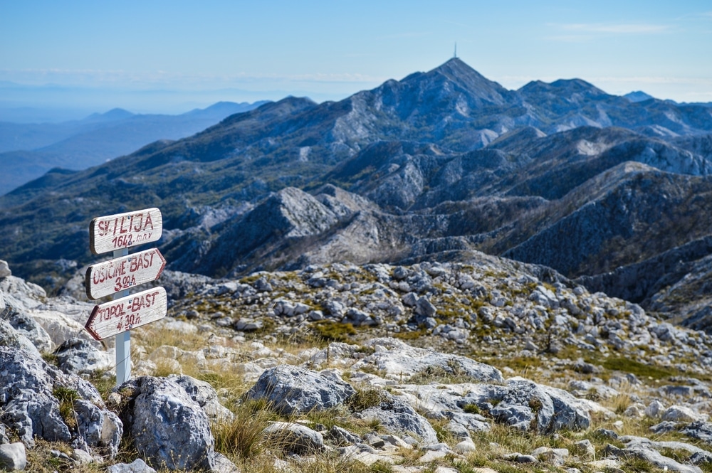 a sign on a mountain